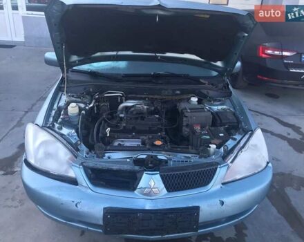 Зеленый Мицубиси Лансер, объемом двигателя 1.6 л и пробегом 184 тыс. км за 2000 $, фото 8 на Automoto.ua