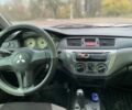 Зелений Міцубісі Lancer, об'ємом двигуна 1.6 л та пробігом 100 тис. км за 3700 $, фото 6 на Automoto.ua