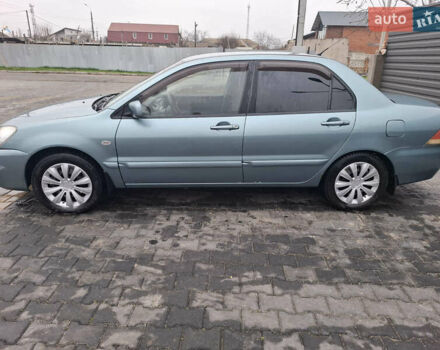 Зелений Міцубісі Lancer, об'ємом двигуна 1.6 л та пробігом 265 тис. км за 3800 $, фото 2 на Automoto.ua