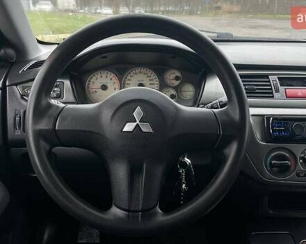 Зелений Міцубісі Lancer, об'ємом двигуна 1.6 л та пробігом 262 тис. км за 3999 $, фото 16 на Automoto.ua
