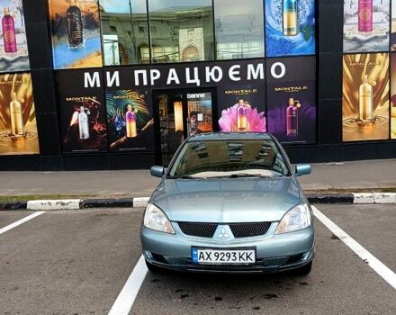Зеленый Мицубиси Лансер, объемом двигателя 1.6 л и пробегом 203 тыс. км за 4100 $, фото 2 на Automoto.ua