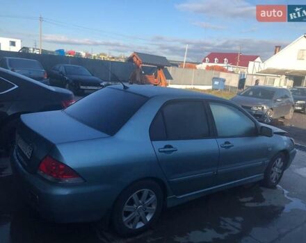 Зеленый Мицубиси Лансер, объемом двигателя 1.6 л и пробегом 184 тыс. км за 2000 $, фото 3 на Automoto.ua