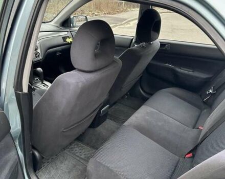 Зеленый Мицубиси Лансер, объемом двигателя 1.58 л и пробегом 207 тыс. км за 4200 $, фото 4 на Automoto.ua