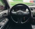 Зелений Міцубісі Lancer, об'ємом двигуна 1.58 л та пробігом 208 тис. км за 3990 $, фото 14 на Automoto.ua