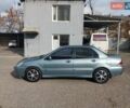 Зеленый Мицубиси Лансер, объемом двигателя 1.6 л и пробегом 270 тыс. км за 4200 $, фото 5 на Automoto.ua