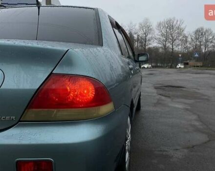 Зелений Міцубісі Lancer, об'ємом двигуна 1.6 л та пробігом 262 тис. км за 3999 $, фото 8 на Automoto.ua