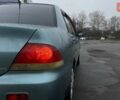 Зелений Міцубісі Lancer, об'ємом двигуна 1.6 л та пробігом 262 тис. км за 3999 $, фото 8 на Automoto.ua