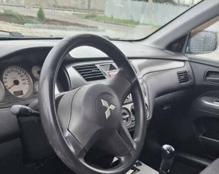 Зелений Міцубісі Lancer, об'ємом двигуна 1.6 л та пробігом 265 тис. км за 3800 $, фото 4 на Automoto.ua