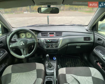 Міцубісі Lancer 2006 у Краматорске на Automoto.ua Зелений Міцубісі Lancer, об'ємом двигуна 1.58 л та пробігом 100 тис. км за 3700 $, фото 5 на Automoto.ua