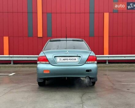 Зелений Міцубісі Lancer, об'ємом двигуна 1.58 л та пробігом 208 тис. км за 3990 $, фото 6 на Automoto.ua