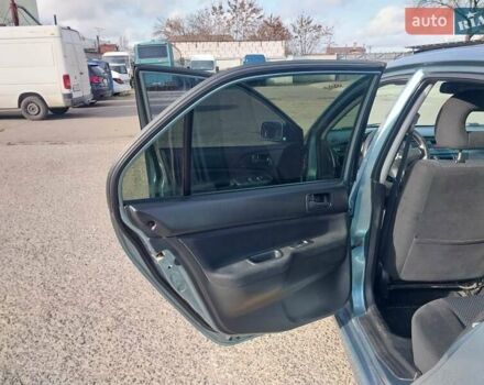Зелений Міцубісі Lancer, об'ємом двигуна 1.58 л та пробігом 272 тис. км за 3800 $, фото 22 на Automoto.ua