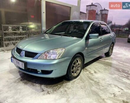 Зеленый Мицубиси Лансер, объемом двигателя 1.58 л и пробегом 352 тыс. км за 3700 $, фото 6 на Automoto.ua