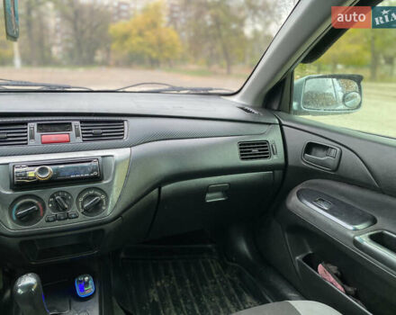 Міцубісі Lancer 2006 у Краматорске на Automoto.ua Зелений Міцубісі Lancer, об'ємом двигуна 1.58 л та пробігом 100 тис. км за 3700 $, фото 7 на Automoto.ua