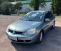 Зелений Міцубісі Lancer, об'ємом двигуна 1.58 л та пробігом 266 тис. км за 4100 $, фото 1 на Automoto.ua