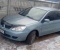 Зелений Міцубісі Lancer, об'ємом двигуна 1.6 л та пробігом 320 тис. км за 4500 $, фото 1 на Automoto.ua