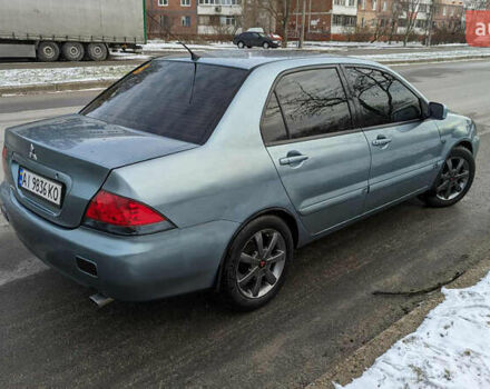 Зелений Міцубісі Lancer, об'ємом двигуна 1.6 л та пробігом 320 тис. км за 4500 $, фото 1 на Automoto.ua