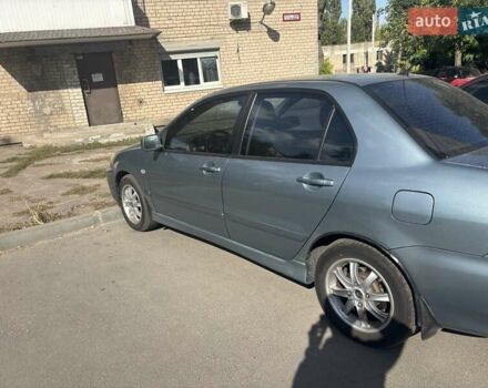 Зелений Міцубісі Lancer, об'ємом двигуна 1.6 л та пробігом 203 тис. км за 4500 $, фото 1 на Automoto.ua