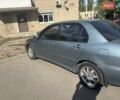 Зелений Міцубісі Lancer, об'ємом двигуна 1.6 л та пробігом 203 тис. км за 4500 $, фото 1 на Automoto.ua