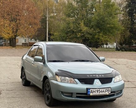 Зелений Міцубісі Lancer, об'ємом двигуна 1.6 л та пробігом 100 тис. км за 3700 $, фото 2 на Automoto.ua
