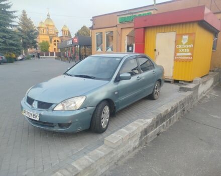 Зеленый Мицубиси Лансер, объемом двигателя 1.6 л и пробегом 150 тыс. км за 2600 $, фото 1 на Automoto.ua