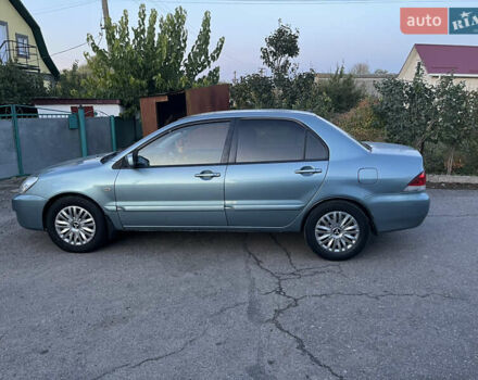 Зелений Міцубісі Lancer, об'ємом двигуна 1.6 л та пробігом 252 тис. км за 3650 $, фото 12 на Automoto.ua