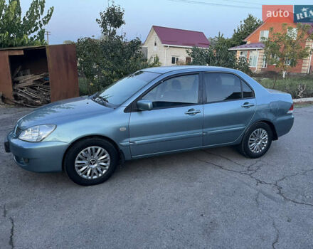 Зелений Міцубісі Lancer, об'ємом двигуна 1.6 л та пробігом 252 тис. км за 3650 $, фото 11 на Automoto.ua