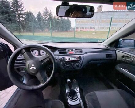 Зеленый Мицубиси Лансер, объемом двигателя 1.58 л и пробегом 352 тыс. км за 3700 $, фото 8 на Automoto.ua