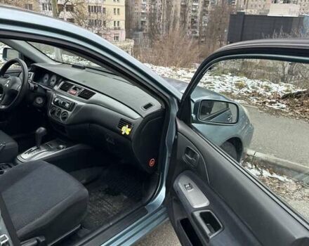 Зеленый Мицубиси Лансер, объемом двигателя 1.58 л и пробегом 207 тыс. км за 4200 $, фото 9 на Automoto.ua