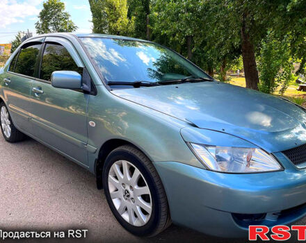 Зелений Міцубісі Lancer, об'ємом двигуна 1.6 л та пробігом 290 тис. км за 4450 $, фото 2 на Automoto.ua