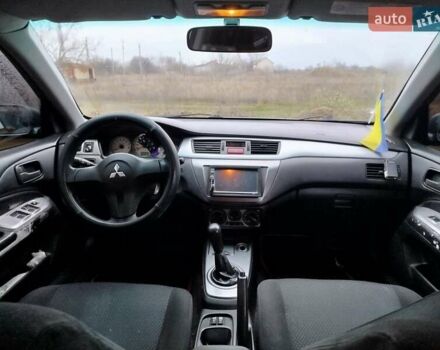 Зеленый Мицубиси Лансер, объемом двигателя 1.58 л и пробегом 224 тыс. км за 3500 $, фото 11 на Automoto.ua