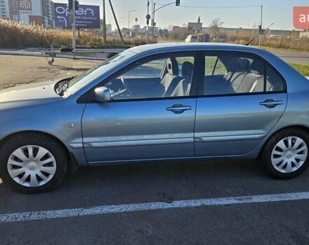 Зелений Міцубісі Lancer, об'ємом двигуна 1.58 л та пробігом 215 тис. км за 5000 $, фото 5 на Automoto.ua