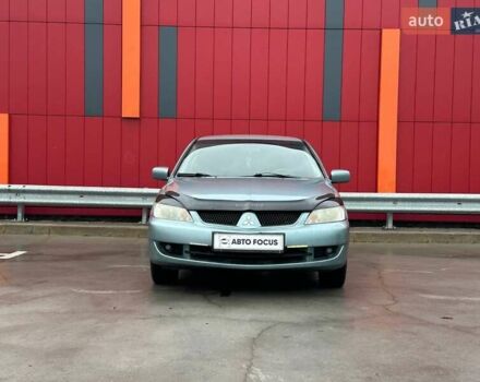 Зелений Міцубісі Lancer, об'ємом двигуна 1.58 л та пробігом 208 тис. км за 3990 $, фото 2 на Automoto.ua