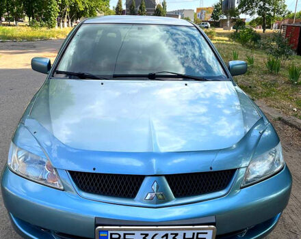 Зелений Міцубісі Lancer, об'ємом двигуна 1.6 л та пробігом 290 тис. км за 4450 $, фото 10 на Automoto.ua