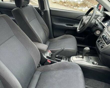 Зеленый Мицубиси Лансер, объемом двигателя 1.58 л и пробегом 207 тыс. км за 4200 $, фото 18 на Automoto.ua