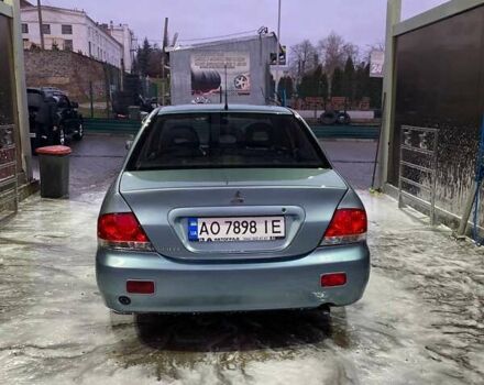 Зеленый Мицубиси Лансер, объемом двигателя 1.58 л и пробегом 352 тыс. км за 3700 $, фото 5 на Automoto.ua