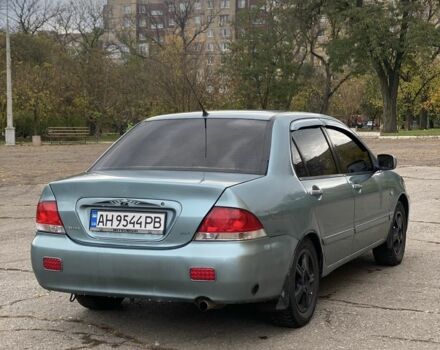 Зелений Міцубісі Lancer, об'ємом двигуна 1.6 л та пробігом 100 тис. км за 3700 $, фото 3 на Automoto.ua