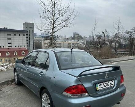 Зеленый Мицубиси Лансер, объемом двигателя 1.58 л и пробегом 207 тыс. км за 4200 $, фото 15 на Automoto.ua