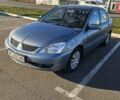 Зелений Міцубісі Lancer, об'ємом двигуна 1.58 л та пробігом 215 тис. км за 5000 $, фото 1 на Automoto.ua