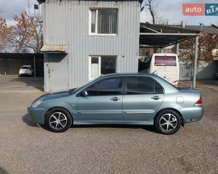 Зелений Міцубісі Lancer, об'ємом двигуна 1.58 л та пробігом 272 тис. км за 3800 $, фото 2 на Automoto.ua