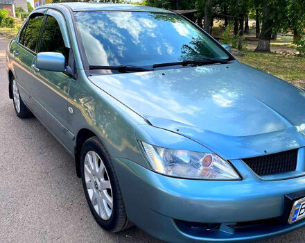Зелений Міцубісі Lancer, об'ємом двигуна 1.6 л та пробігом 290 тис. км за 4450 $, фото 8 на Automoto.ua