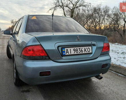Зелений Міцубісі Lancer, об'ємом двигуна 1.6 л та пробігом 320 тис. км за 4500 $, фото 3 на Automoto.ua