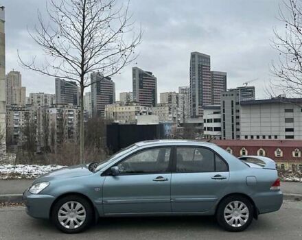 Зеленый Мицубиси Лансер, объемом двигателя 1.58 л и пробегом 207 тыс. км за 4200 $, фото 8 на Automoto.ua