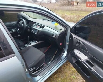 Зеленый Мицубиси Лансер, объемом двигателя 1.58 л и пробегом 224 тыс. км за 3500 $, фото 12 на Automoto.ua