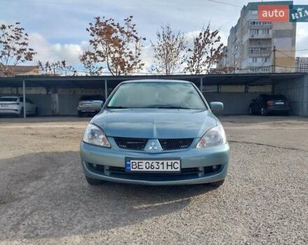 Зелений Міцубісі Lancer, об'ємом двигуна 1.58 л та пробігом 272 тис. км за 3800 $, фото 3 на Automoto.ua