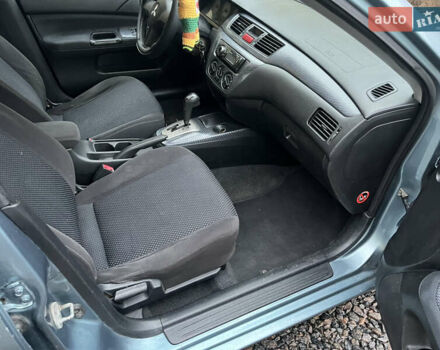 Зелений Міцубісі Lancer, об'ємом двигуна 1.6 л та пробігом 252 тис. км за 3650 $, фото 20 на Automoto.ua