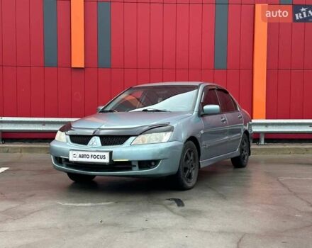 Зелений Міцубісі Lancer, об'ємом двигуна 1.58 л та пробігом 208 тис. км за 3990 $, фото 3 на Automoto.ua