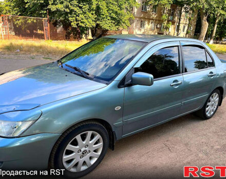 Зелений Міцубісі Lancer, об'ємом двигуна 1.6 л та пробігом 290 тис. км за 4450 $, фото 1 на Automoto.ua