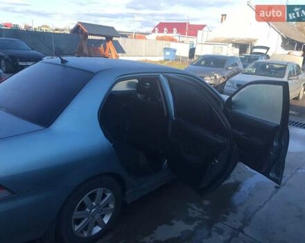 Зеленый Мицубиси Лансер, объемом двигателя 1.6 л и пробегом 184 тыс. км за 2000 $, фото 7 на Automoto.ua