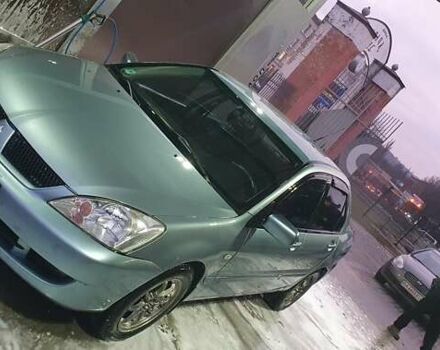 Зеленый Мицубиси Лансер, объемом двигателя 1.58 л и пробегом 352 тыс. км за 3700 $, фото 1 на Automoto.ua