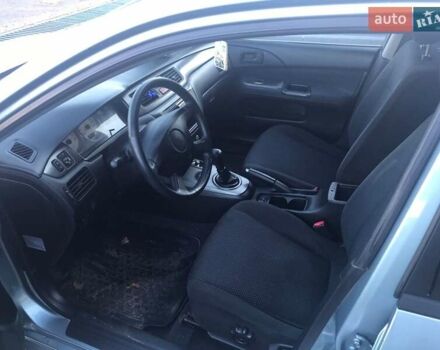 Зеленый Мицубиси Лансер, объемом двигателя 1.6 л и пробегом 184 тыс. км за 2000 $, фото 1 на Automoto.ua